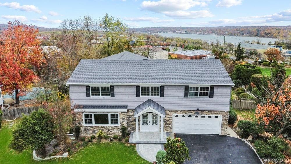 52 Woodland Road. Roslyn, NY 11576