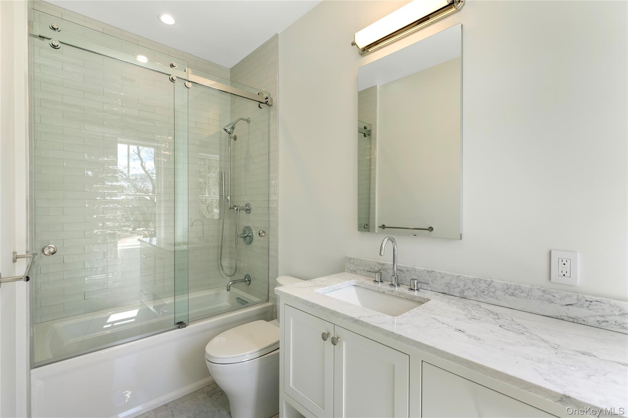 15 Old Point Road. Quogue, NY 11959