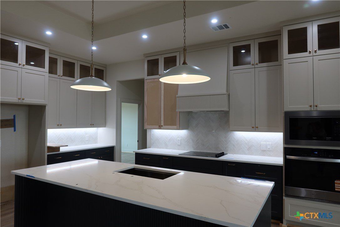 16026 Honey Ridge Drive. Holland, TX 76534