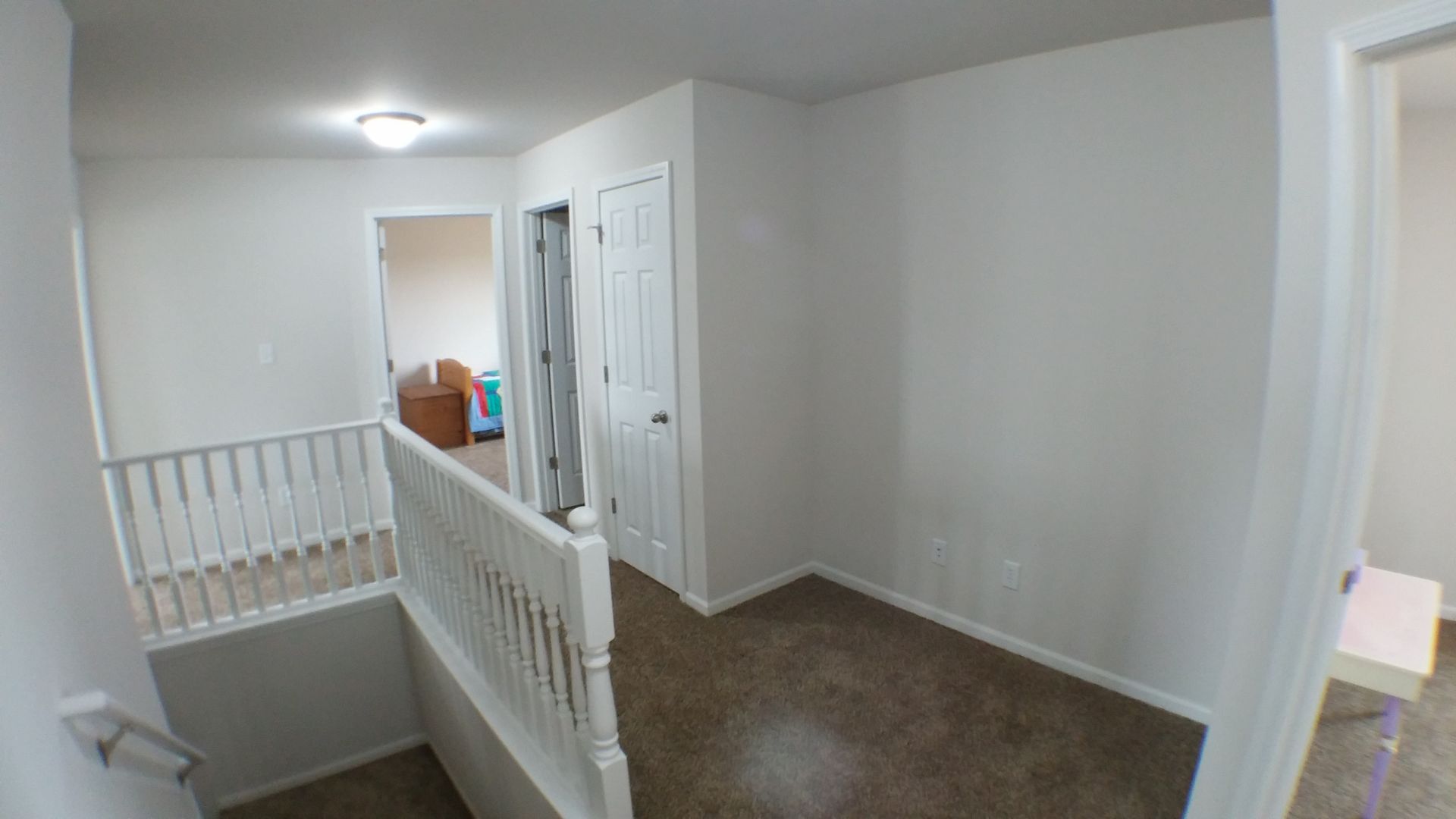 Up hall shows study nook.