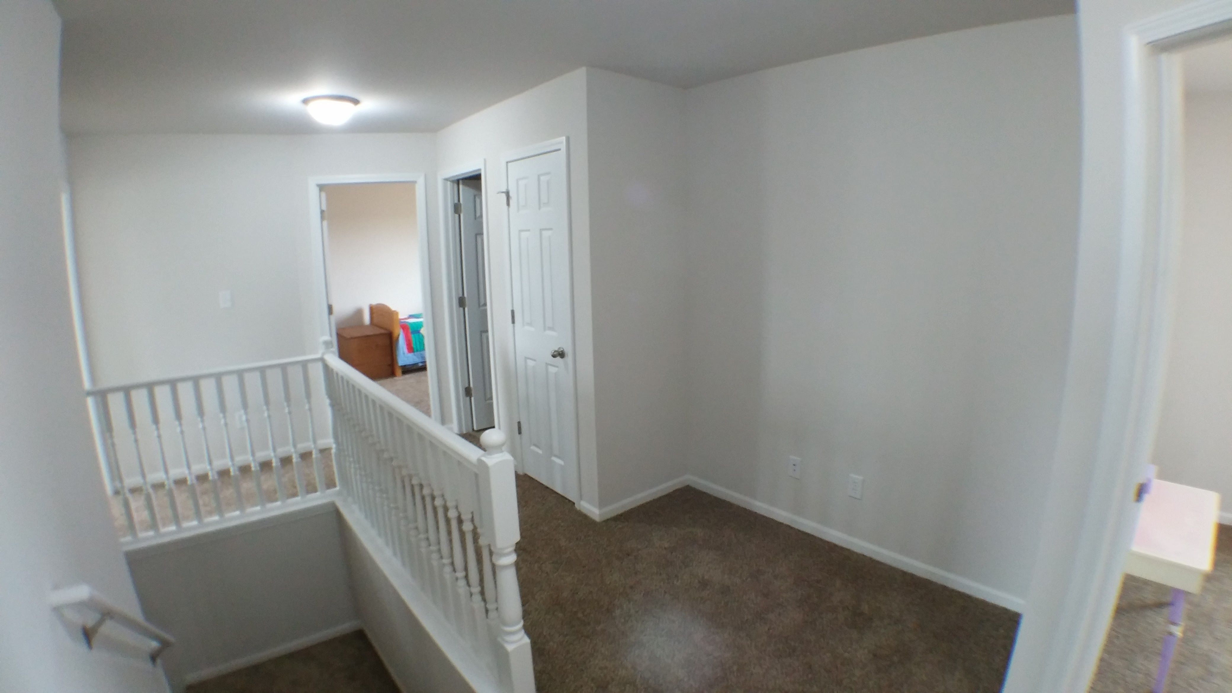 Up hall shows study nook.