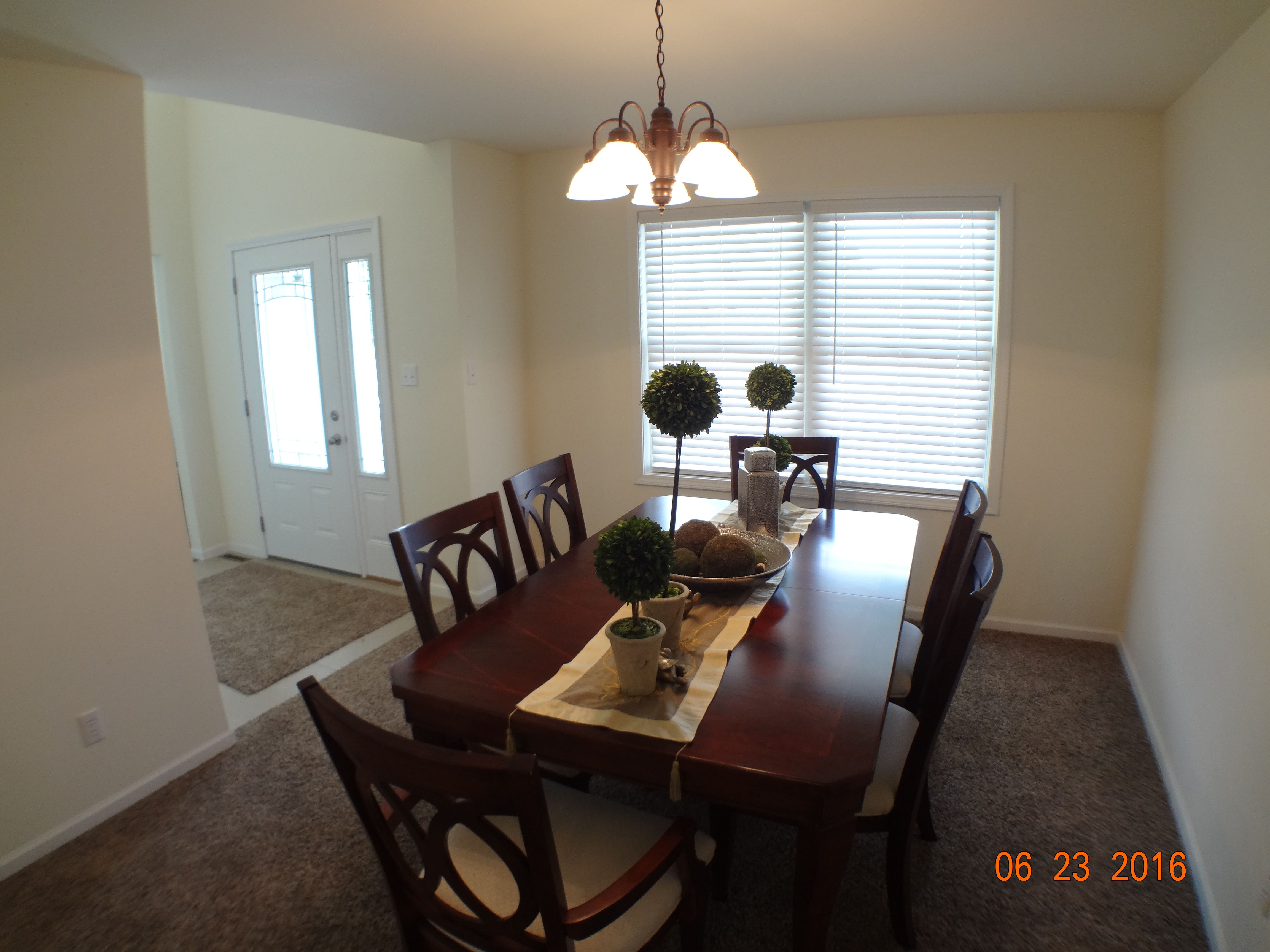 Formal Dining From Stairs by Kit