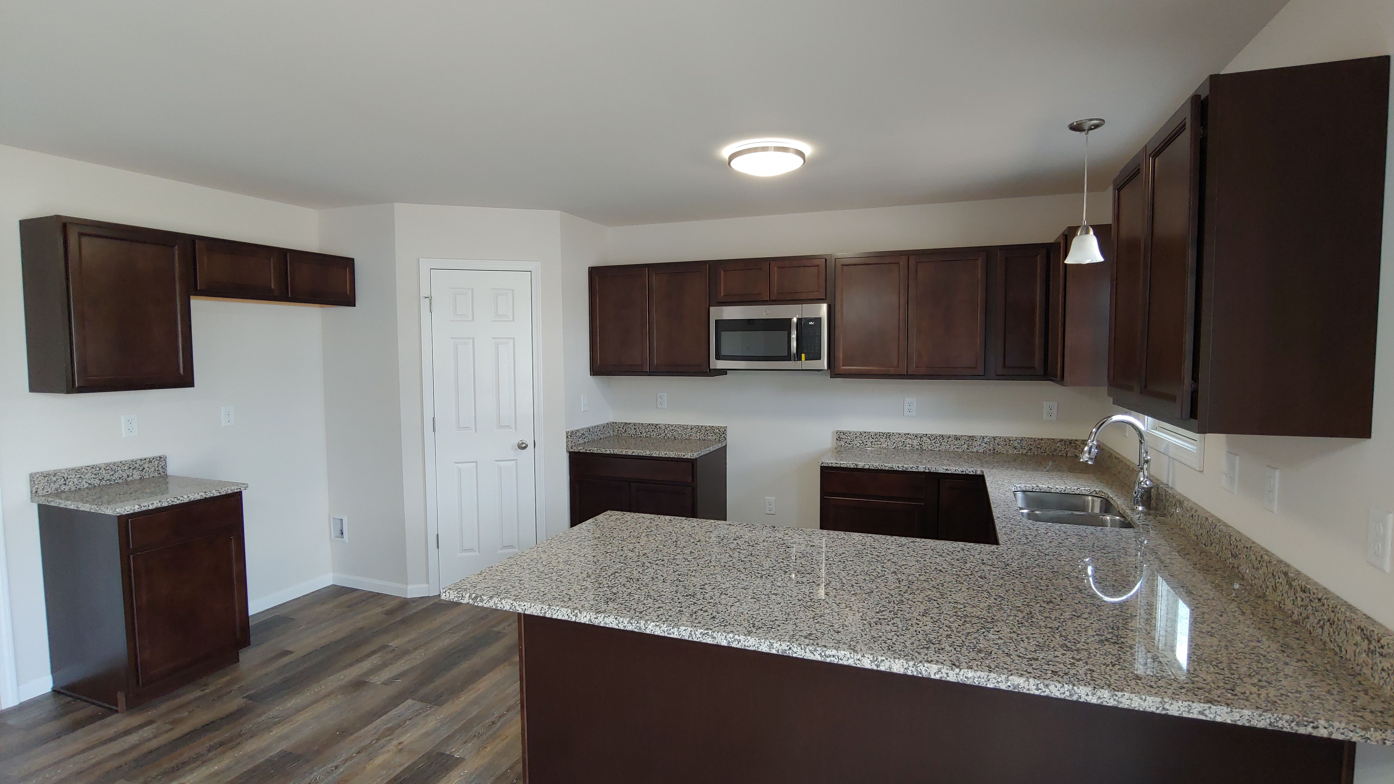 Kitchen Showing Breakfast Bar & WI Pantry