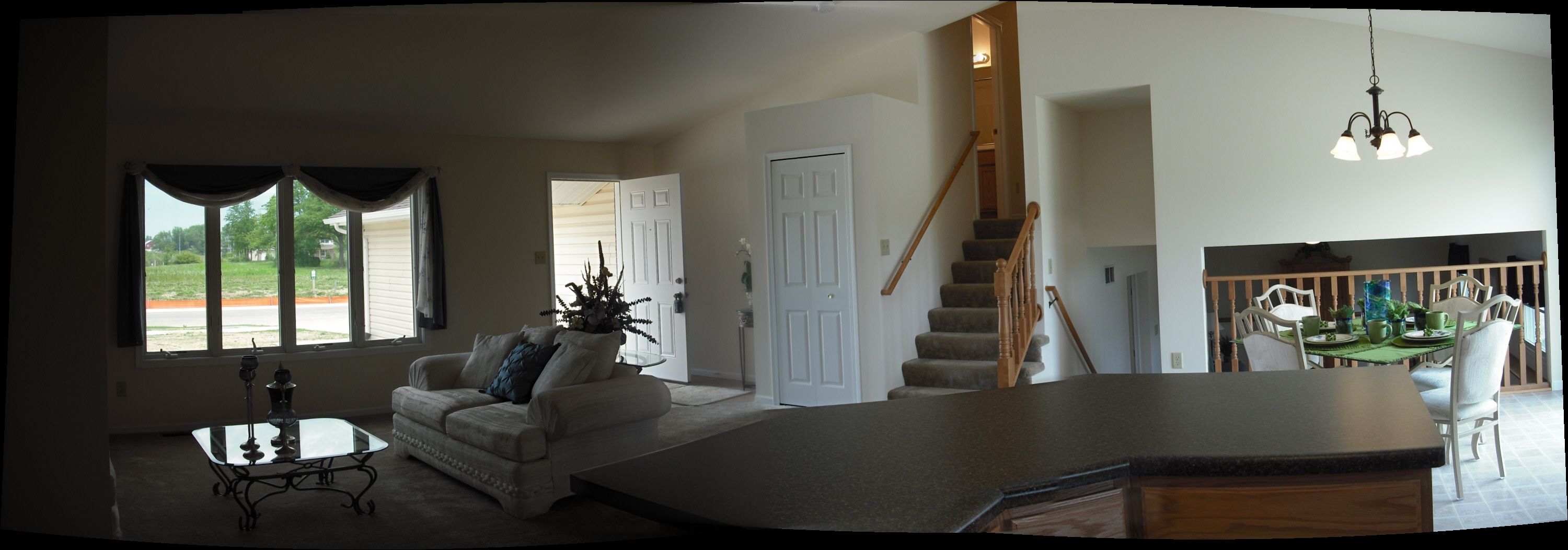 Shows Opt crescent island & vaulted clgs