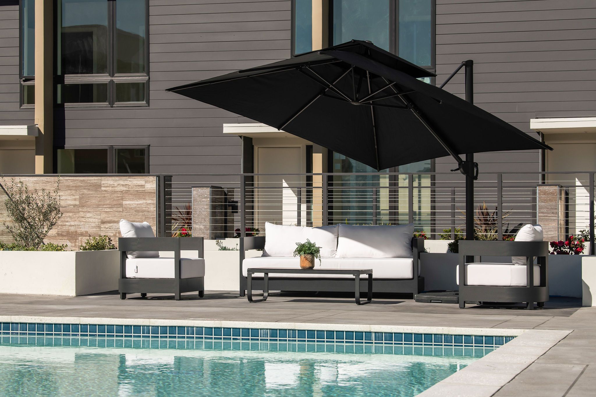 The Collection's Amenity Deck With Heated Pool & Lounge Areas