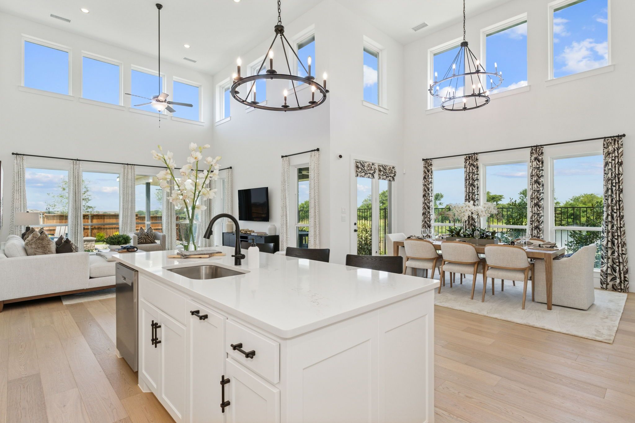 American Legend Homes' 55' model in Ten Mile Creek - Kitchen/Living Room/Dining Room