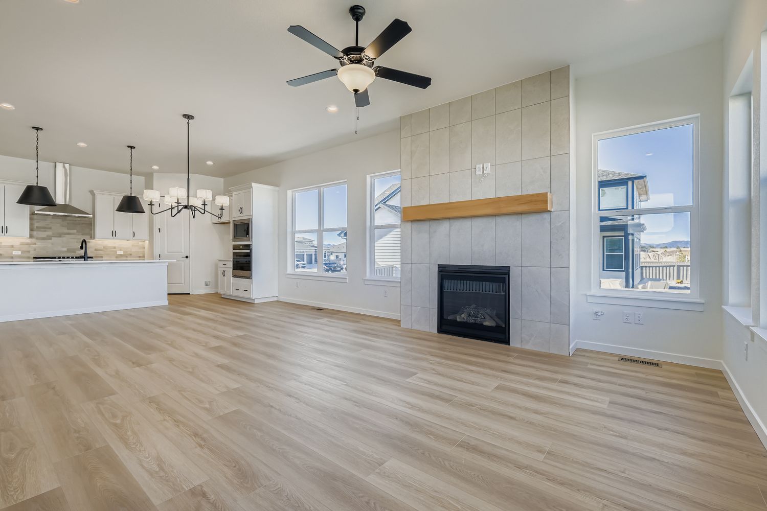 Plan C416 living room/kitchen/dining room representative photo