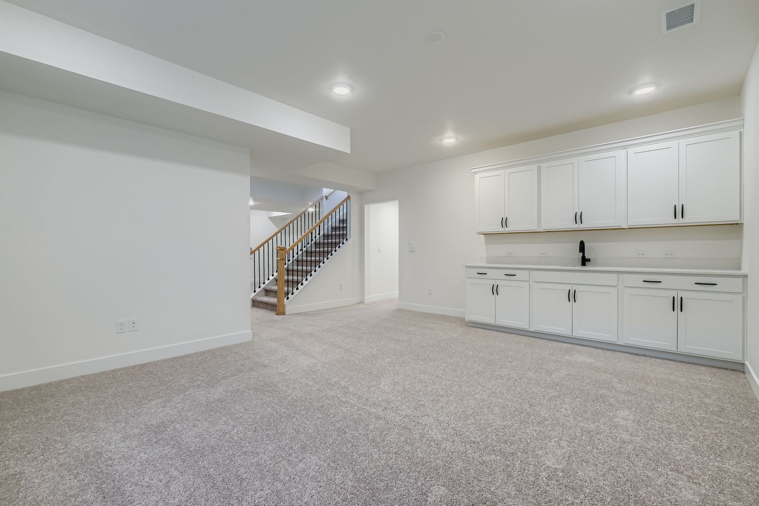 Plan C416 rec room and wet bar representative photo