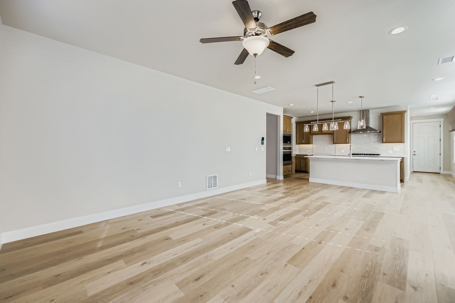 Plan C305 Representative Photo of the Living Room/Dining Area/Kitchen