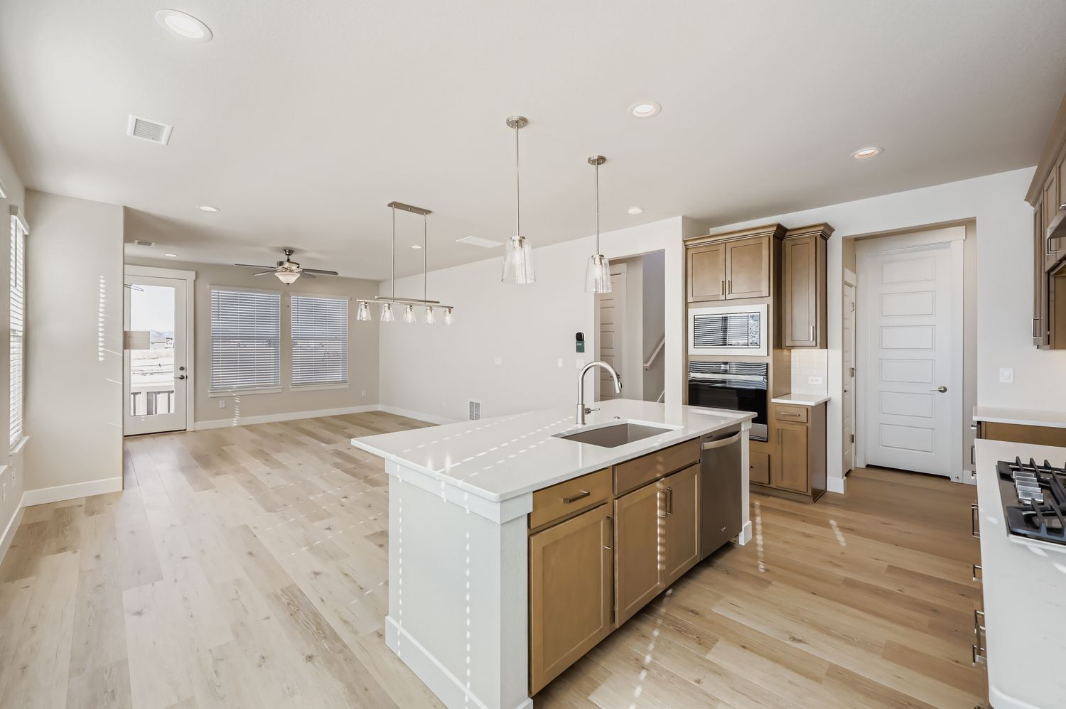 Plan C305 Representative Photo of the Living Room/Dining/Kitchen