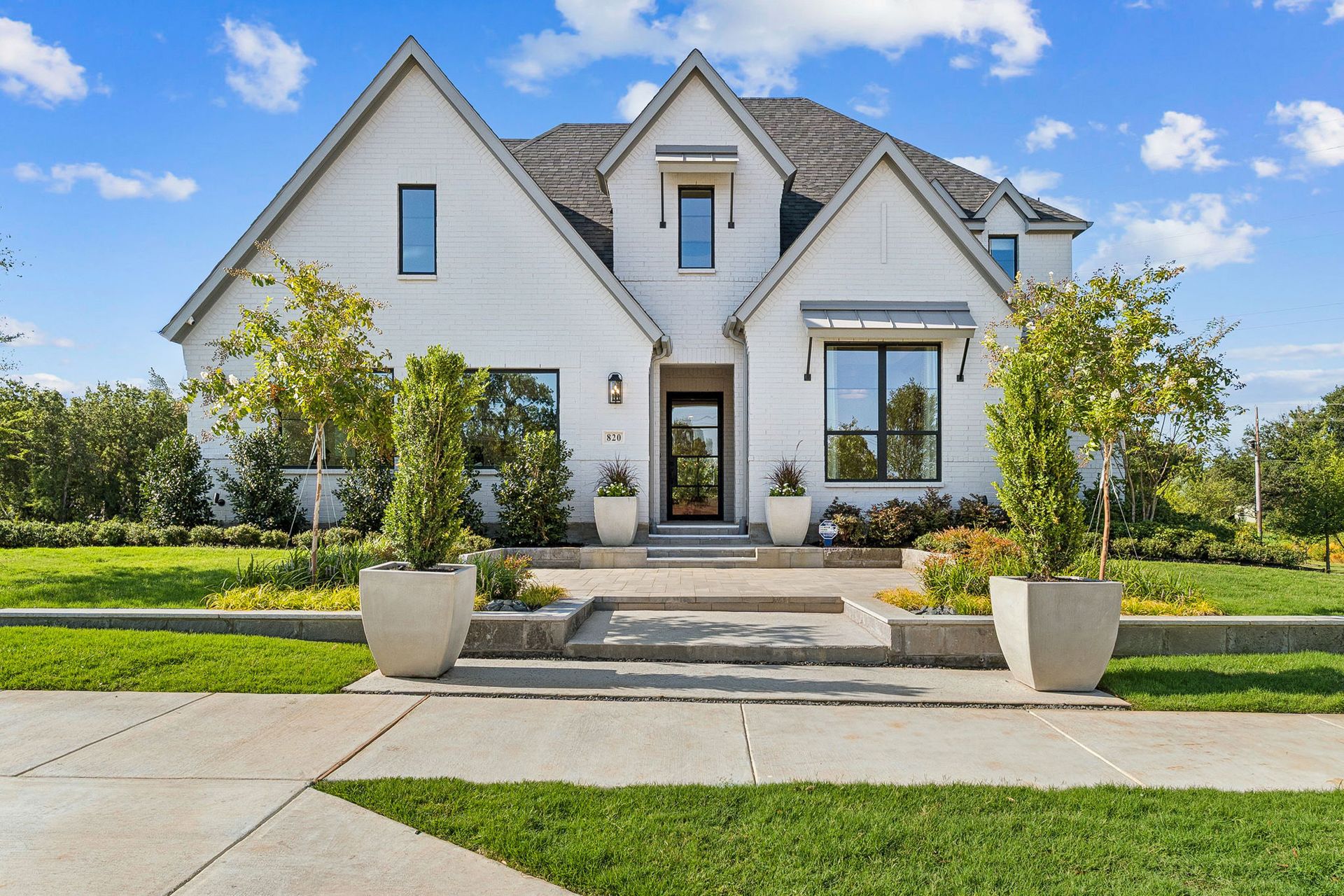Plan 1640 Front Elevation - Bella Casa Model Photo