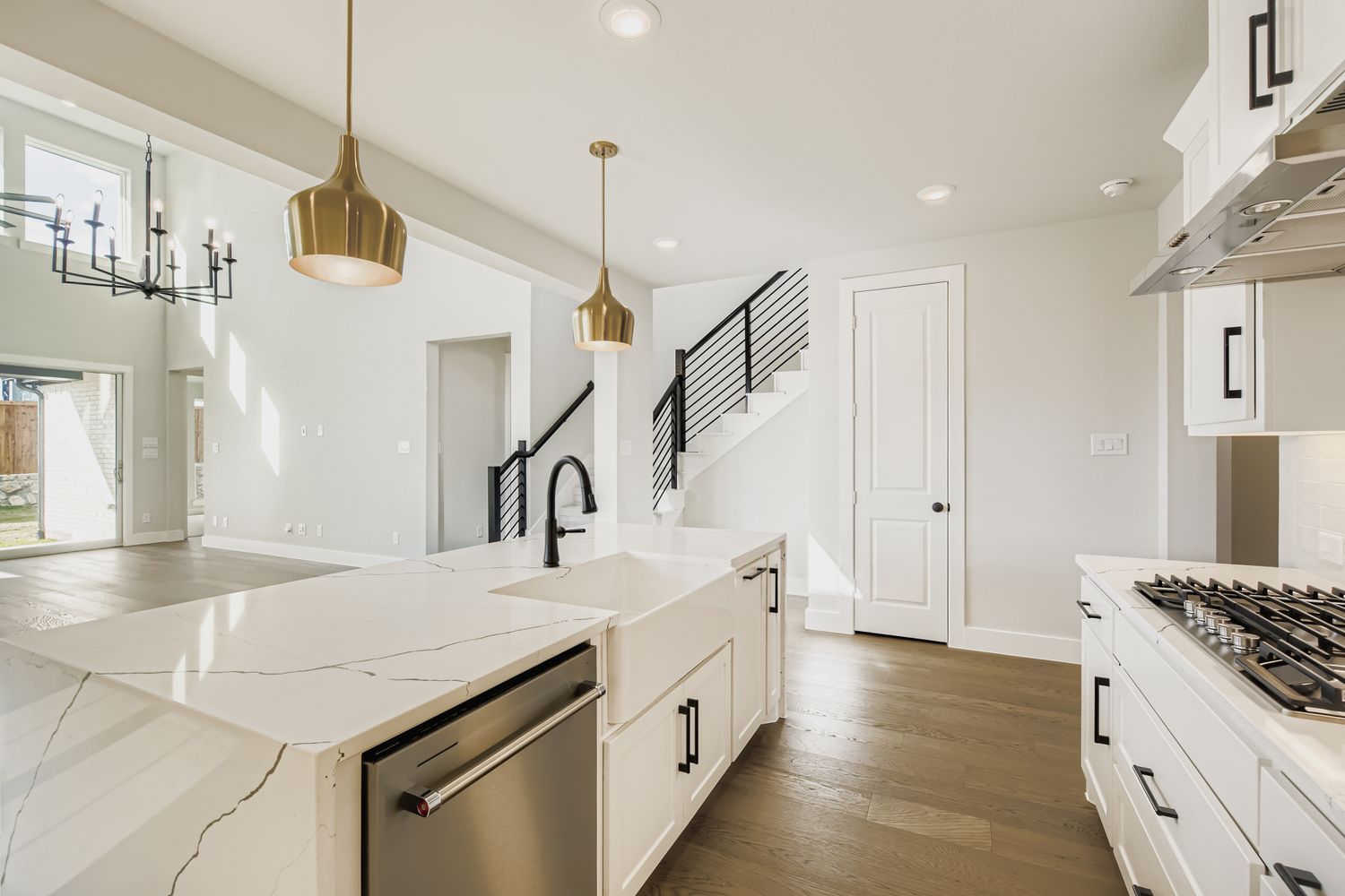 Open Kitchen Flowing into Living Area| Plan 1581 | Representative Photo