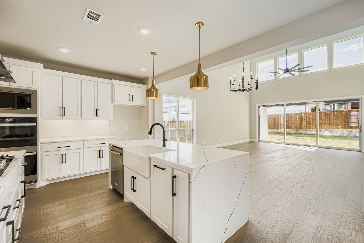 Bright Kitchen with Statement Lighting| Plan 1581 | Representative Photo