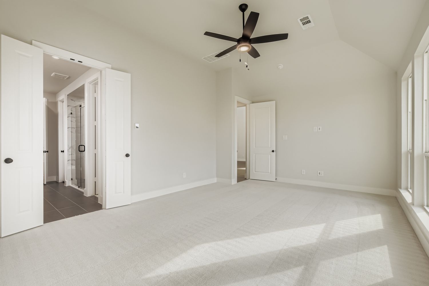 Light-Filled Primary Bedroom| Plan 1581 | Representative Photo