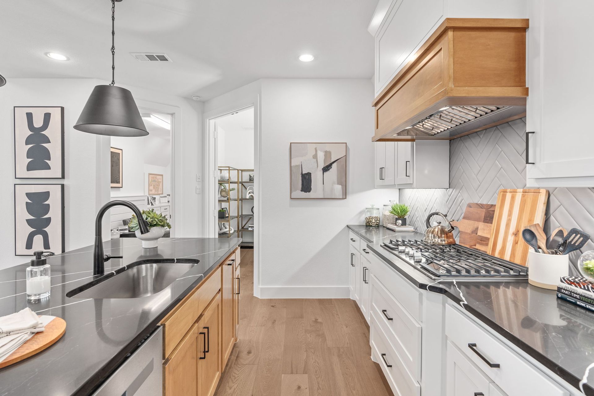 Kitchen Cooktop and Vent Hood – Mosaic Celina Model Home