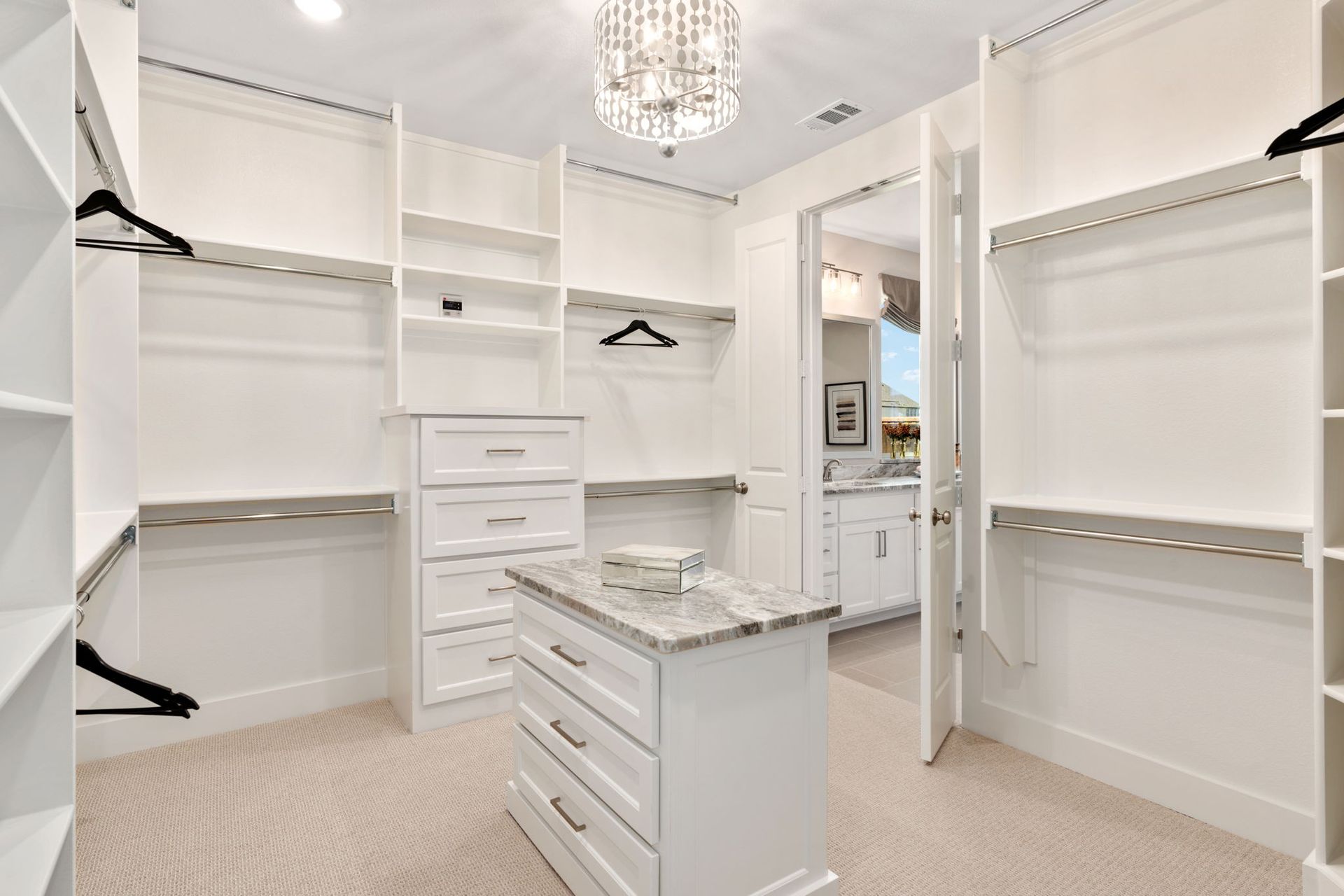 Primary Walk-In Closet with Island – Mosaic Celina 50' Model