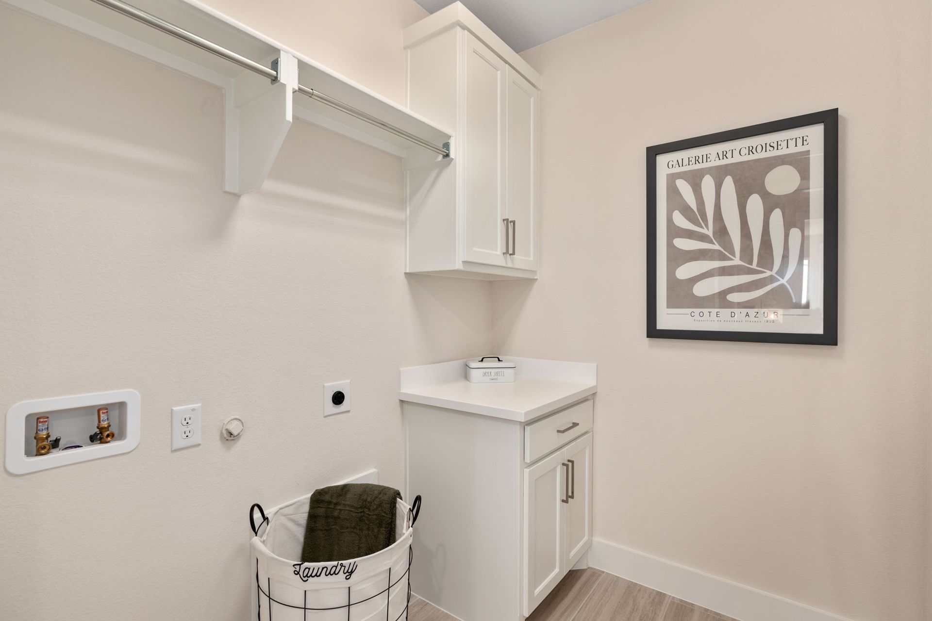 Laundry Room with Built-In Cabinets – Mosaic Celina 50' Model