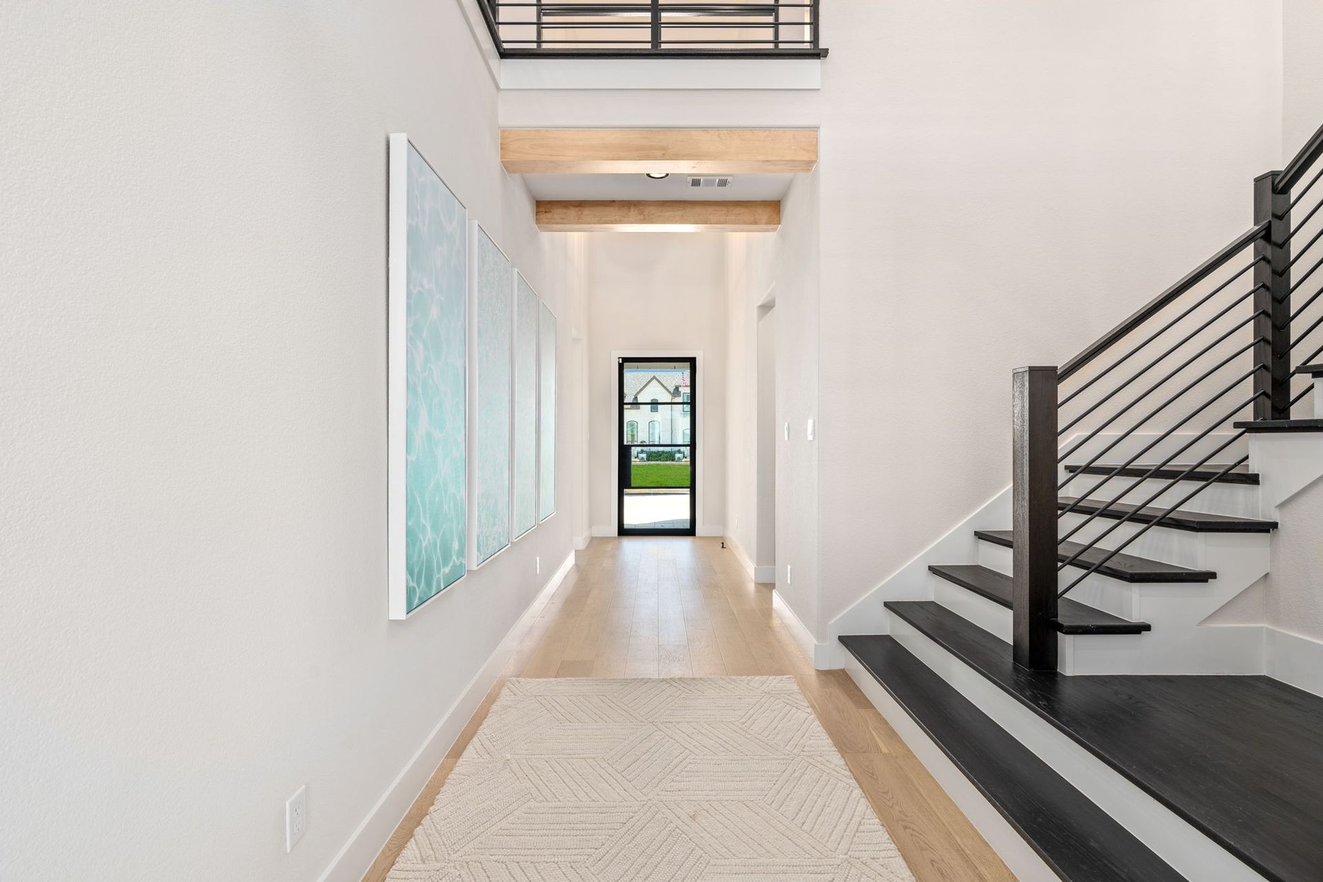 Mosaic 60’ Model Entry Hallway with Staircase