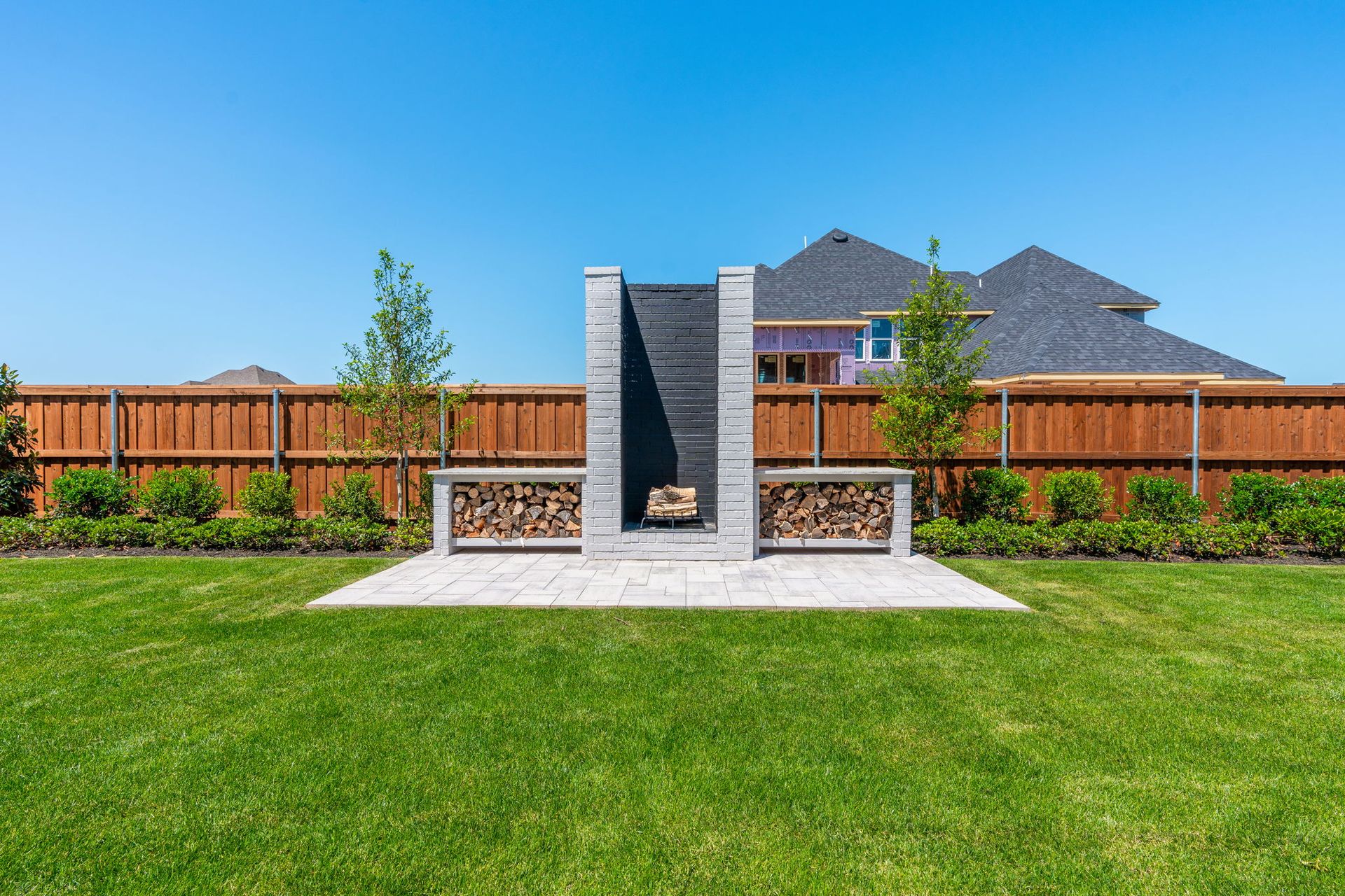 Backyard Fireplace Feature at Mosaic 60' Model | Celina, TX
