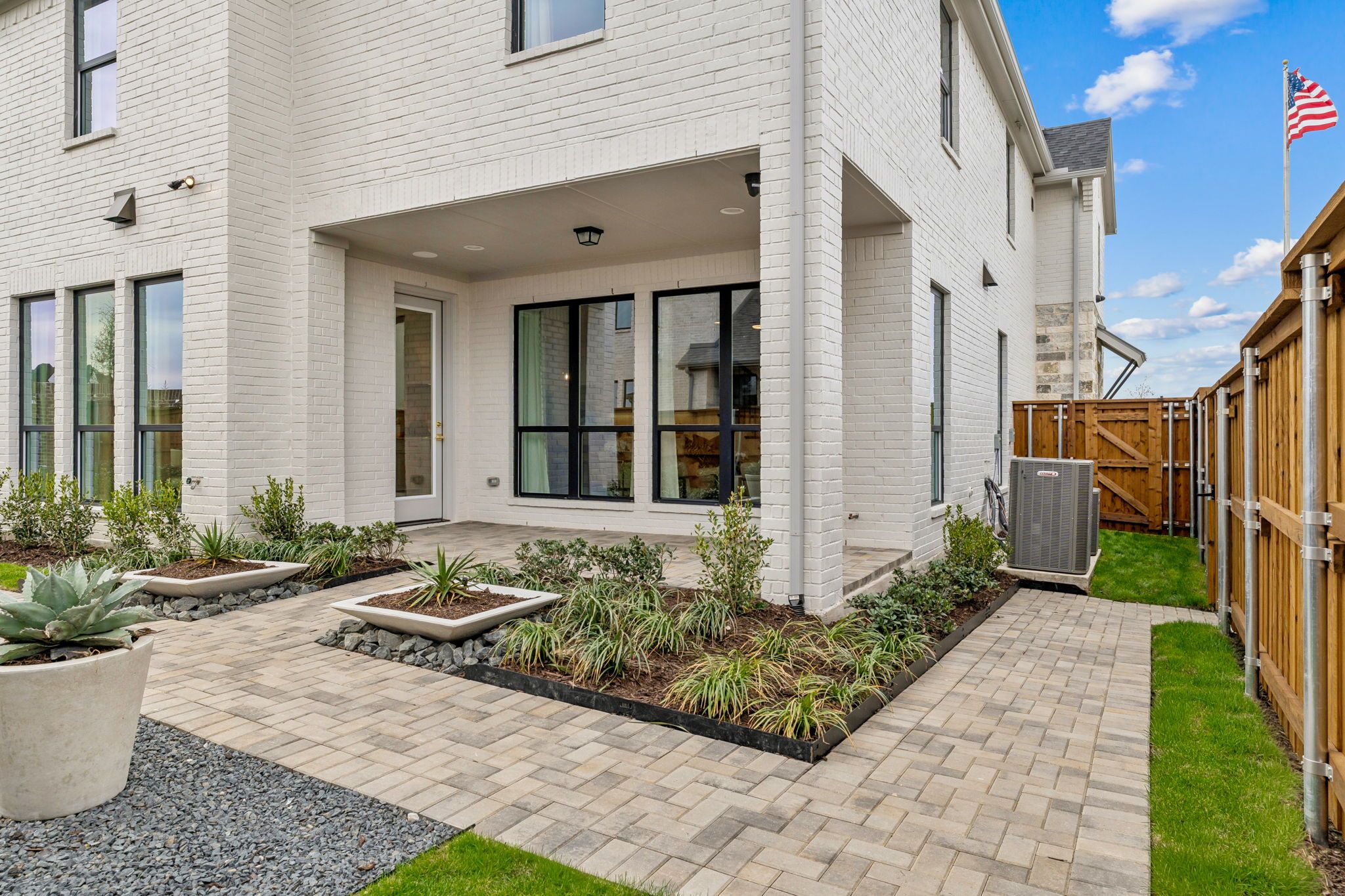 Outdoor Living Space with Modern Brick Exterior – Celina TX