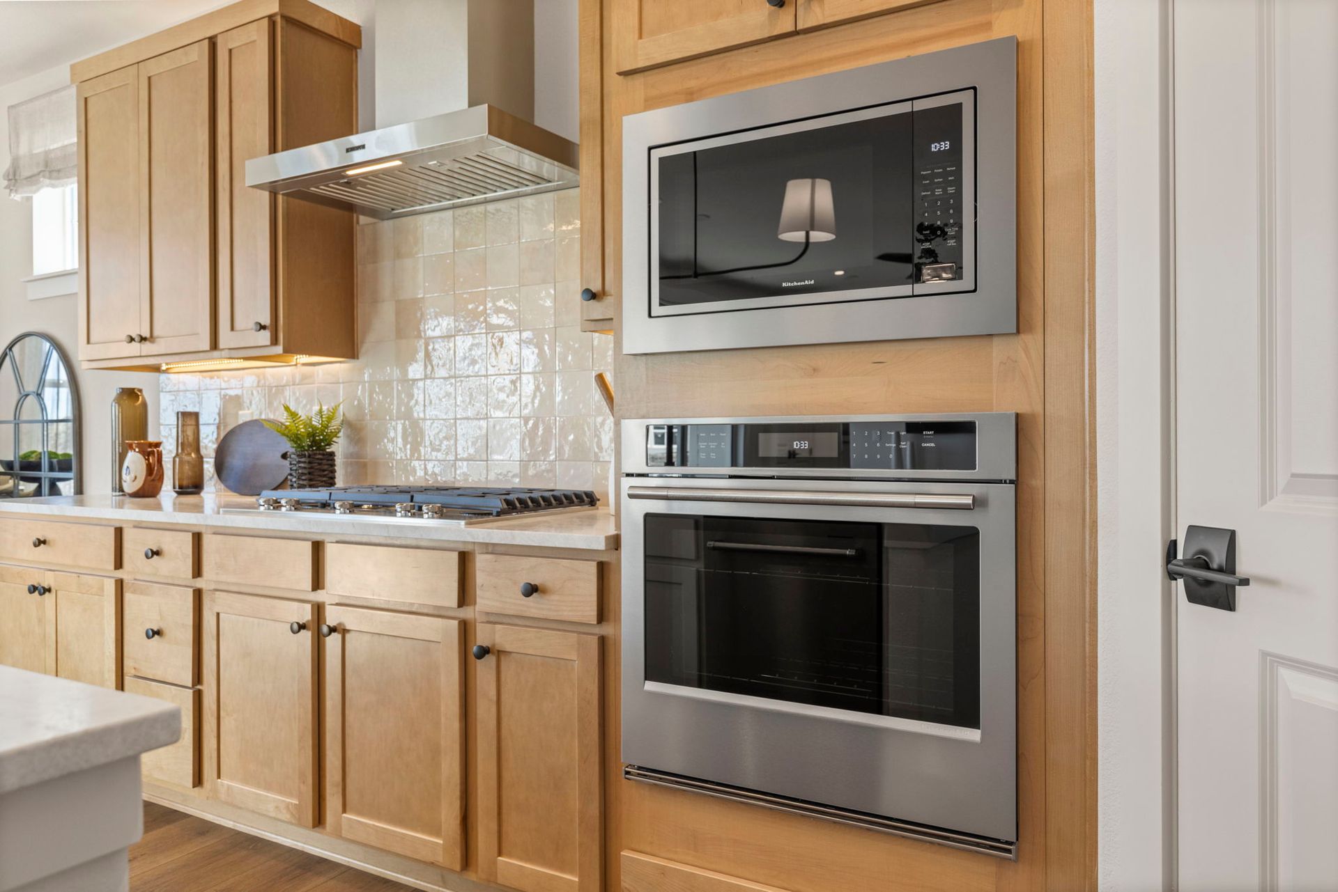 Built-In Oven and Microwave Wall with Designer Cabinets | Barefoot Villages Firestone