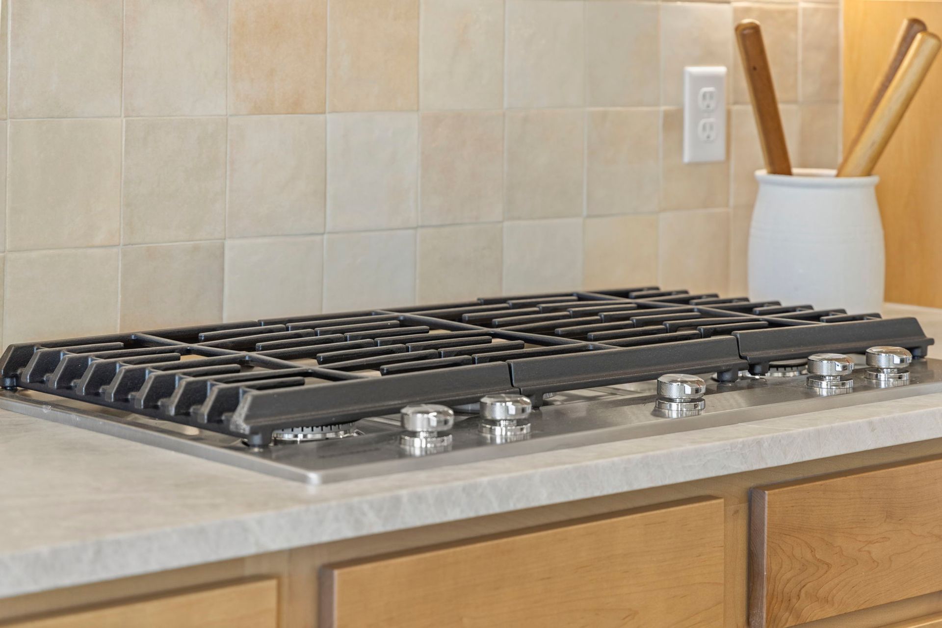 Chef-Style Gas Cooktop with Stone Countertops | Barefoot Villages Kitchen
