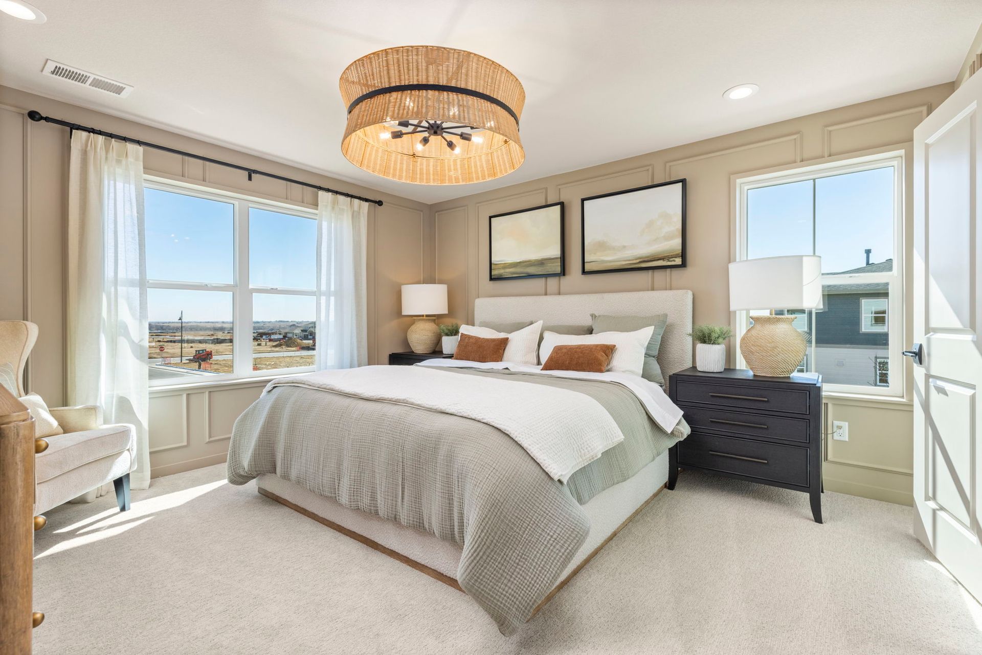 Bright Primary Bedroom with Large Windows | Barefoot Villages Firestone CO