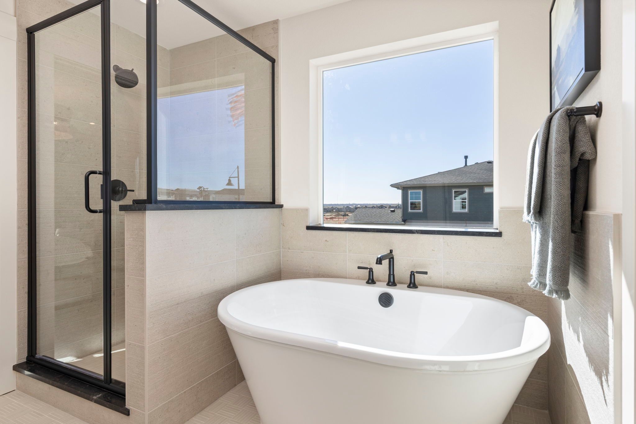 Freestanding Soaking Tub and Glass Shower | Barefoot Villages Firestone