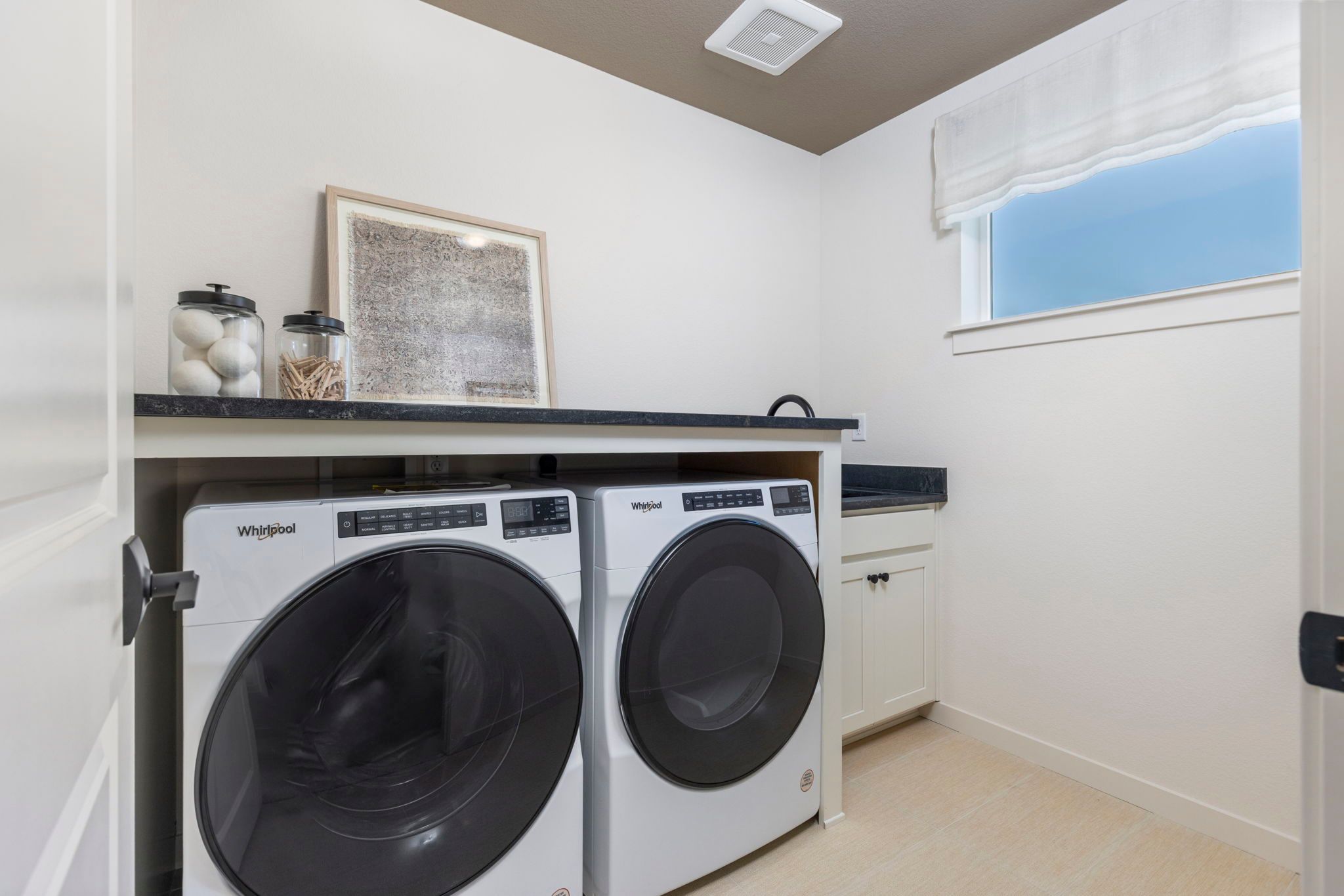 Modern Laundry Room with Washer and Dryer | Barefoot Villages Firestone CO