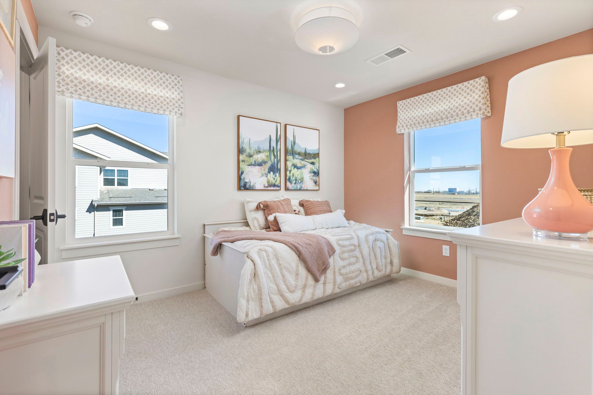 Bright Secondary Bedroom with Designer Decor | Barefoot Villages Firestone CO