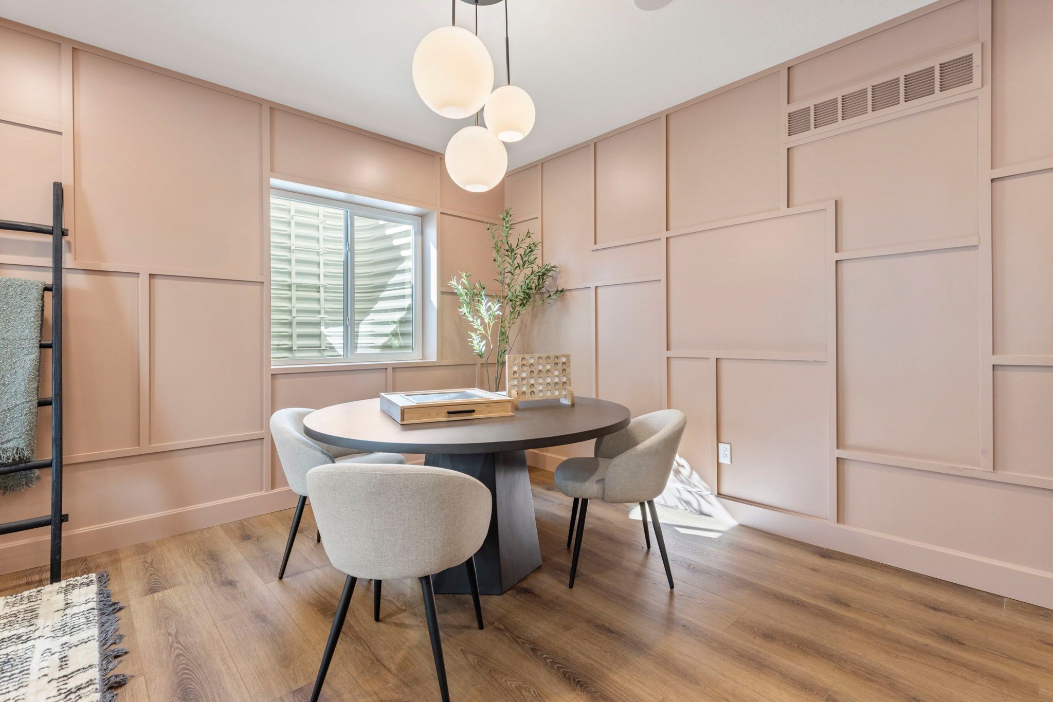 Stylish Game Table Area with Designer Panel Wall | Barefoot Villages Firestone