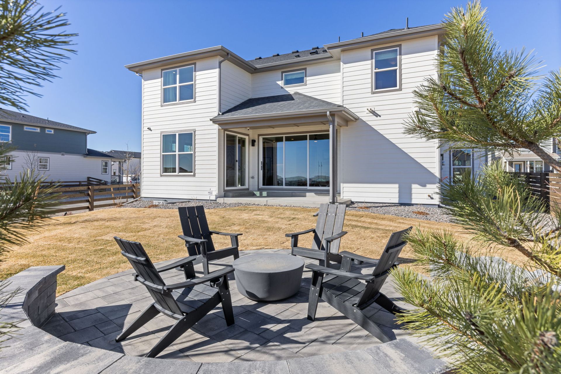 Backyard Patio with Fire Pit Seating | Barefoot Villages Firestone CO