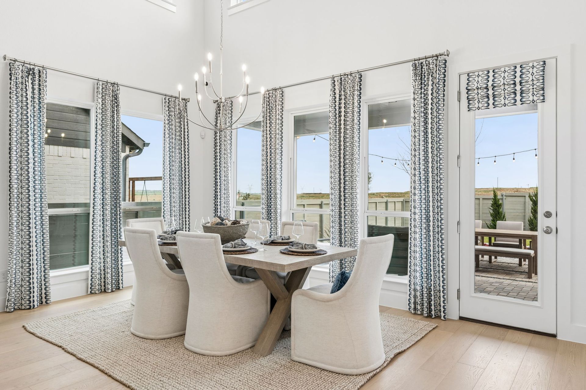 Landmark Model Dining Room with Large Windows