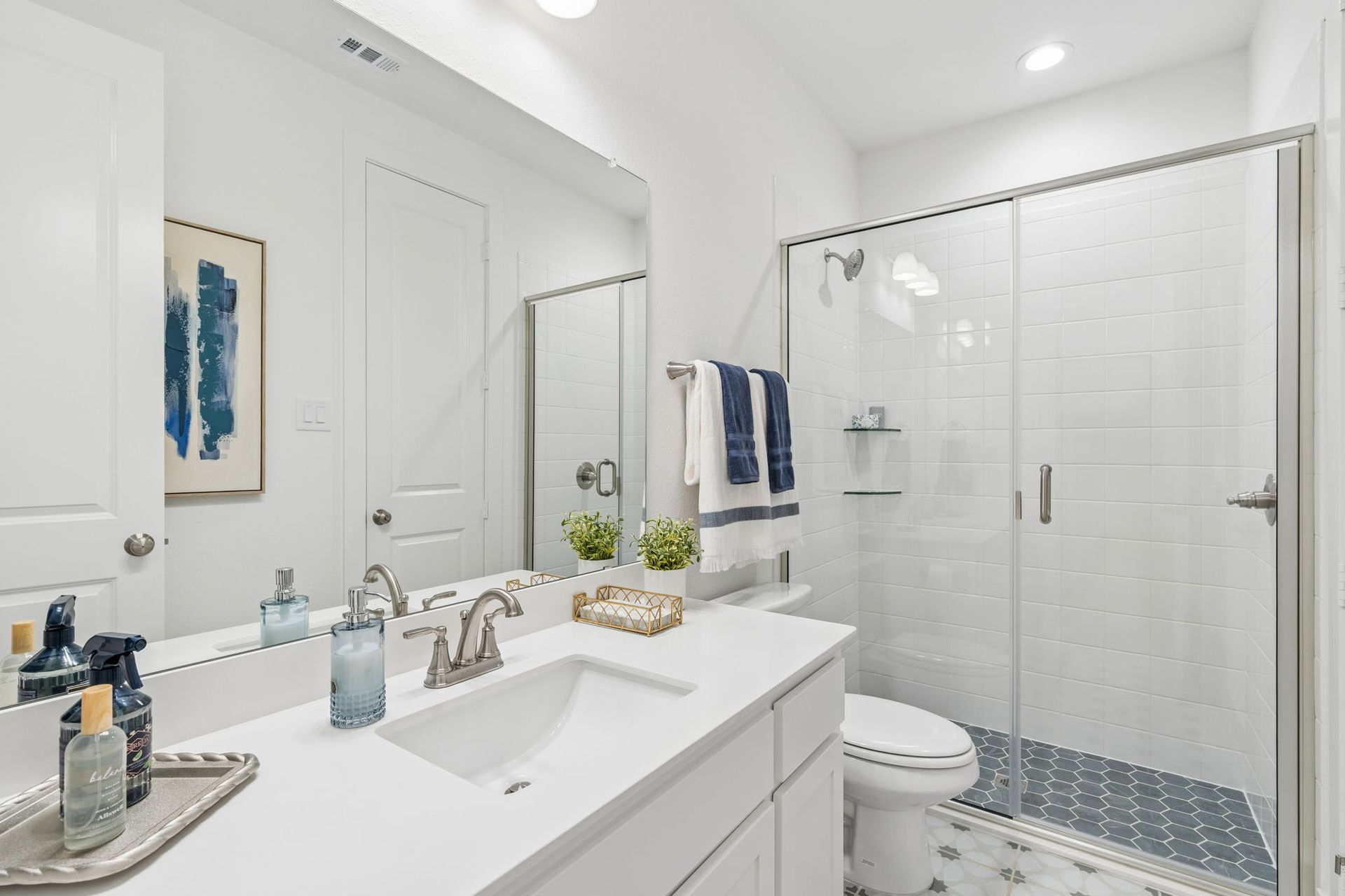 Secondary Bath with Walk-In Shower at Landmark
