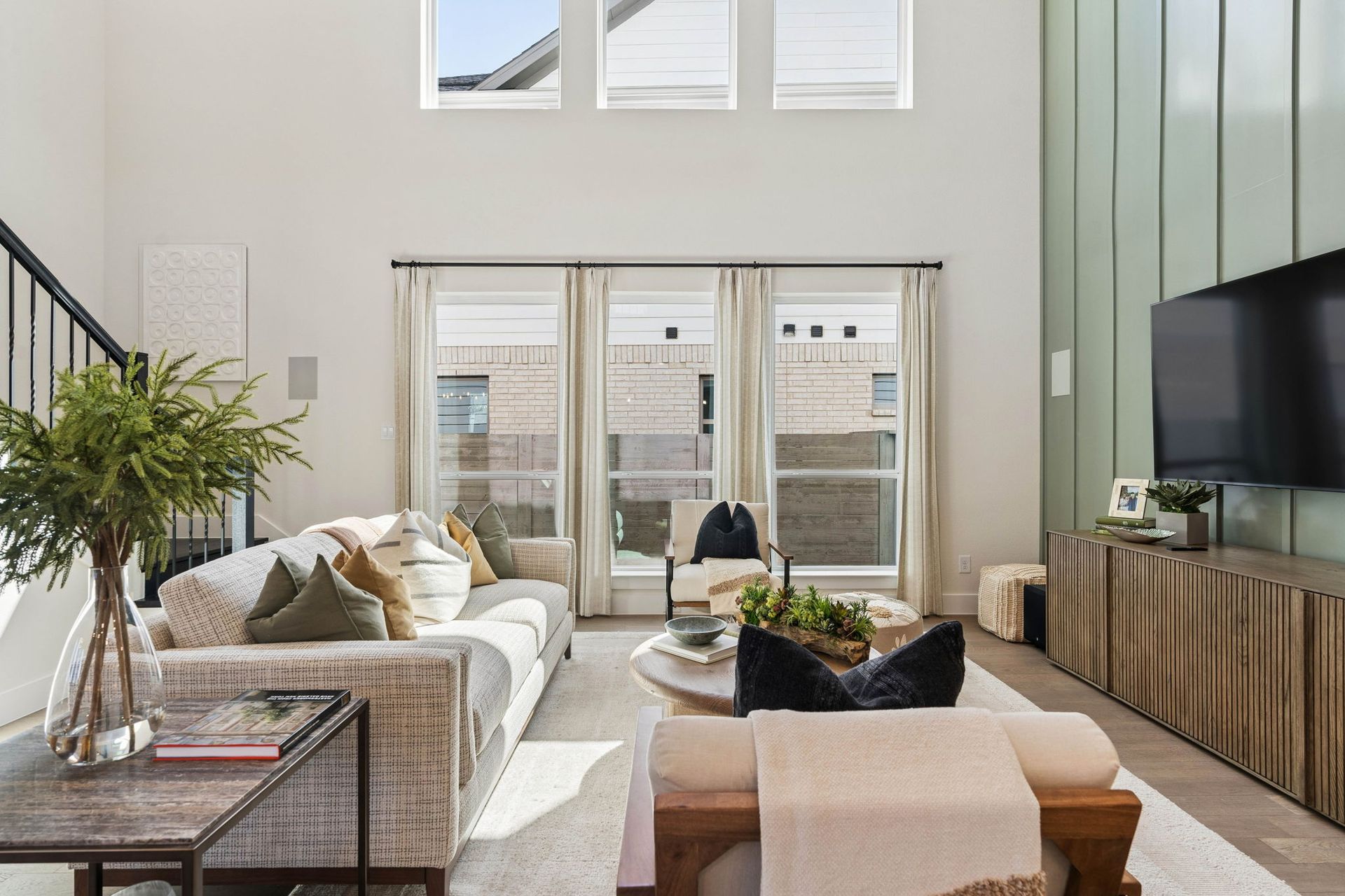 Sunlit Living Room with Two-Story Ceilings - Representative Photo of Plan 1462