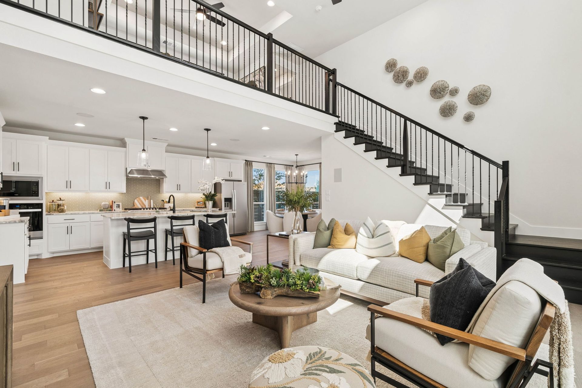 Open Kitchen and Living Space in American Legend Homes - Representative Photo of Plan 1462