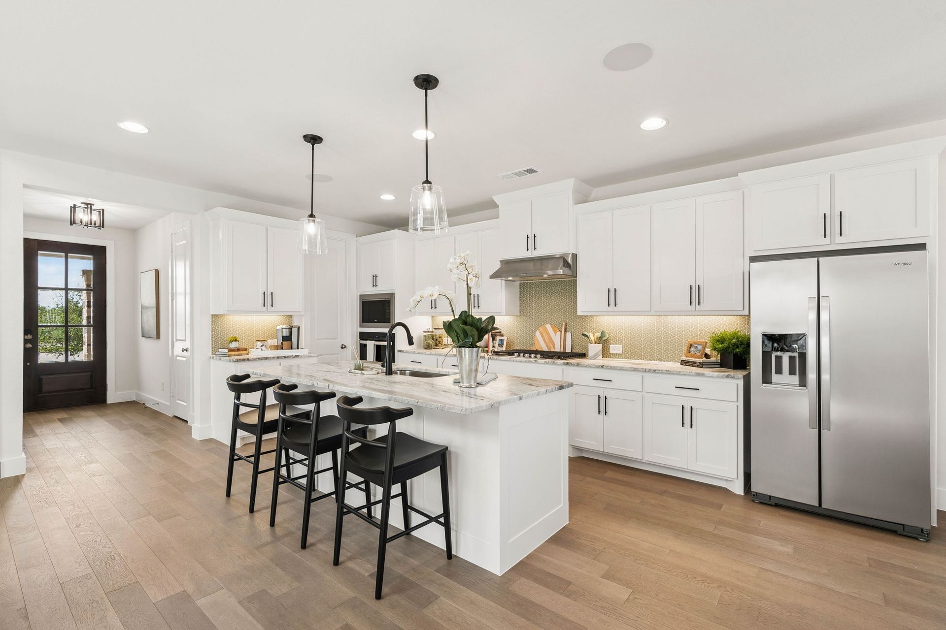 Chef-Inspired Kitchen with Oversized Island - Representative Photo of Plan 1462