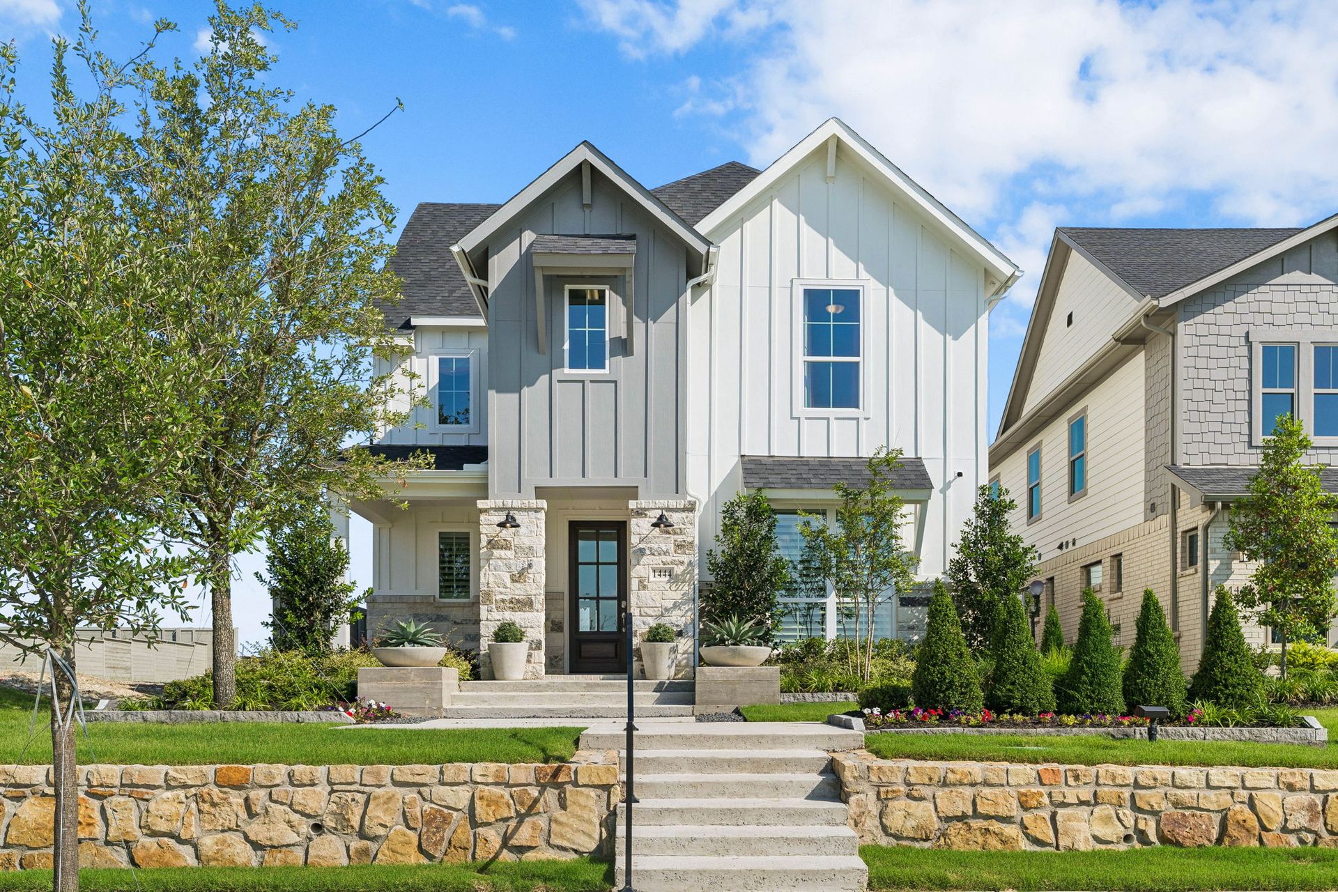 American Legend Homes 40' Model Home Exterior in Ramble Celina TX