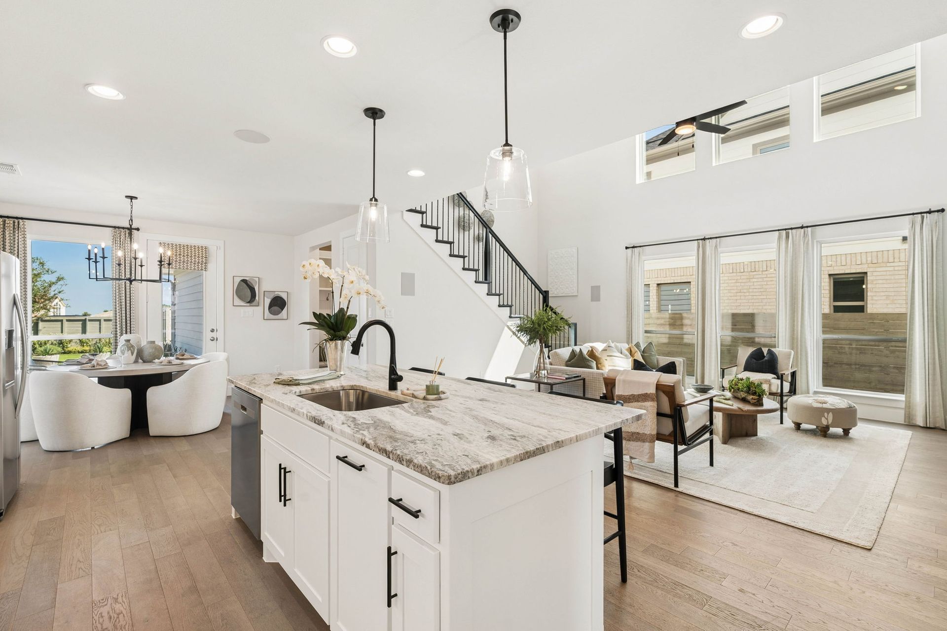Open Concept Kitchen and Living Room in American Legend Homes Ramble Model