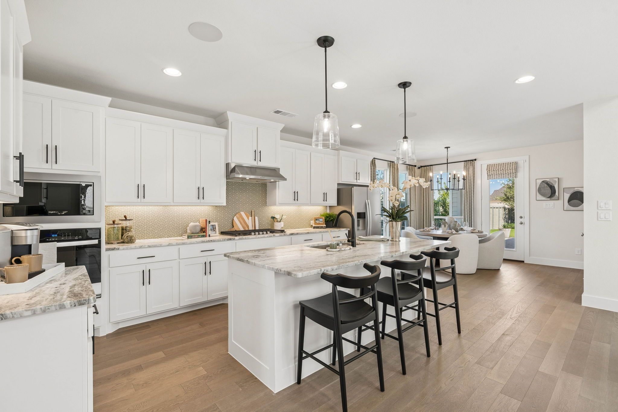 Spacious Kitchen with Island Seating and Dining Space in Ramble