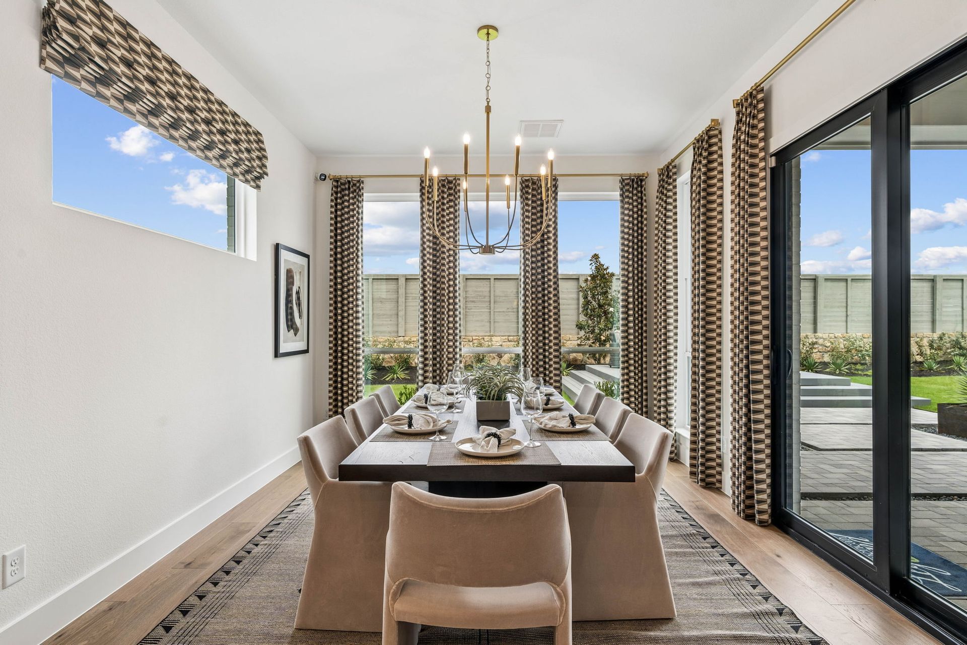 Elegant Dining Room with Views of Outdoor Living