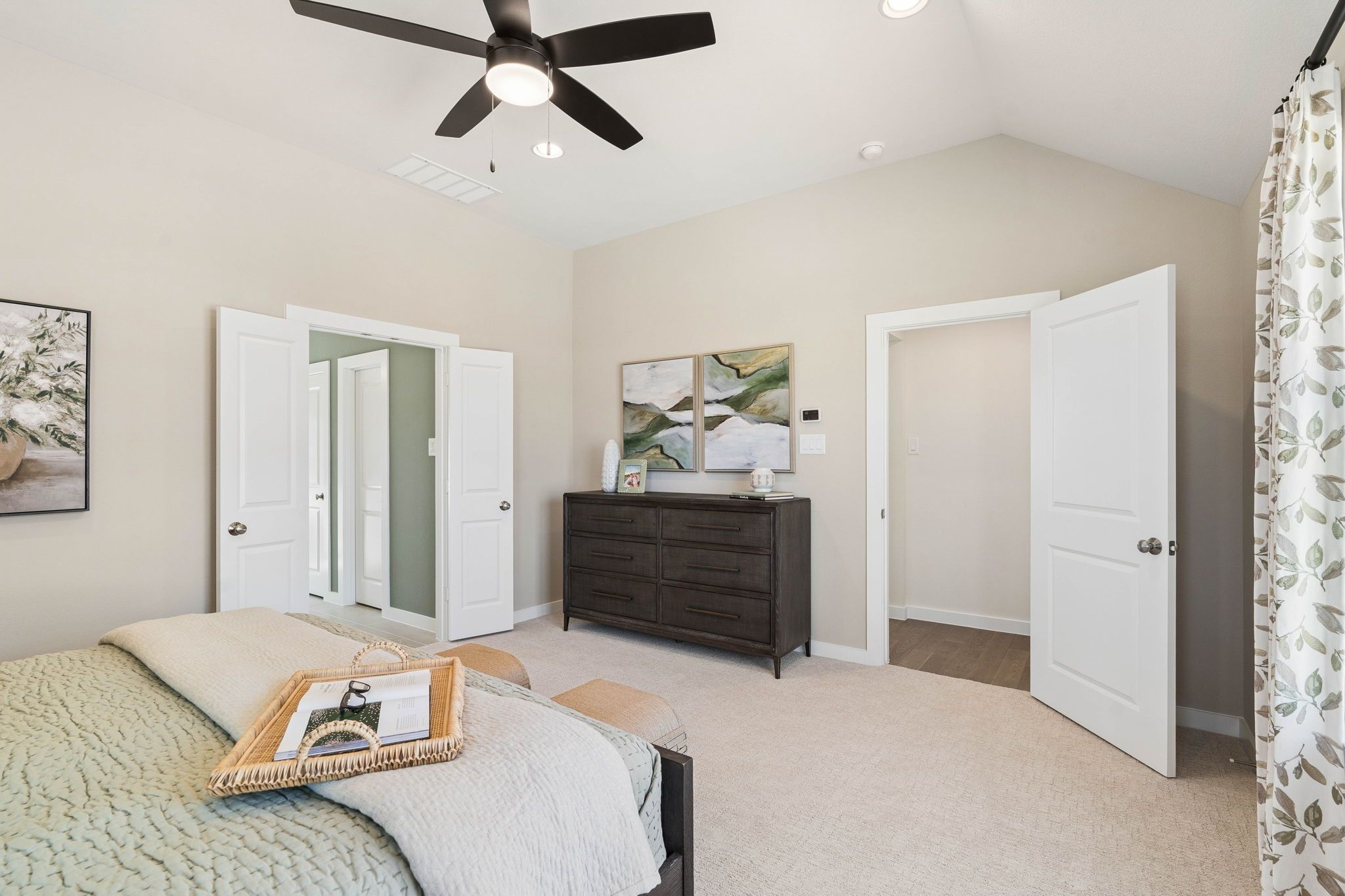 Expansive Primary Bedroom with Designer Finishes