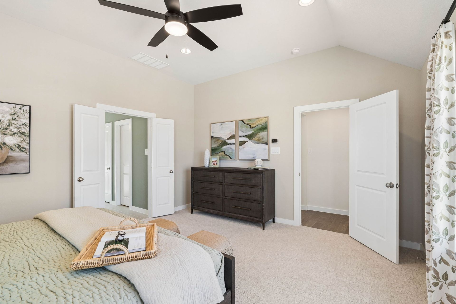 Expansive Primary Bedroom with Designer Finishes