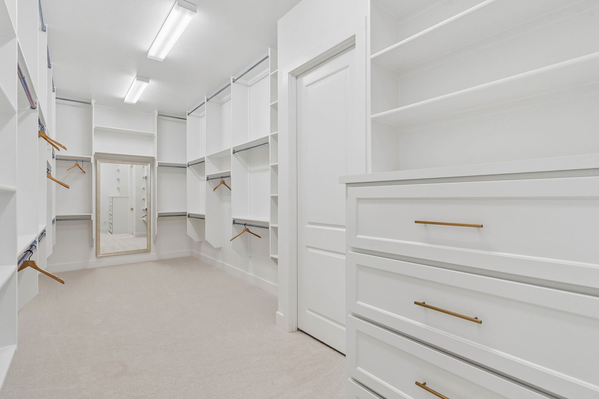 Expansive Walk-In Closet with Custom Storage