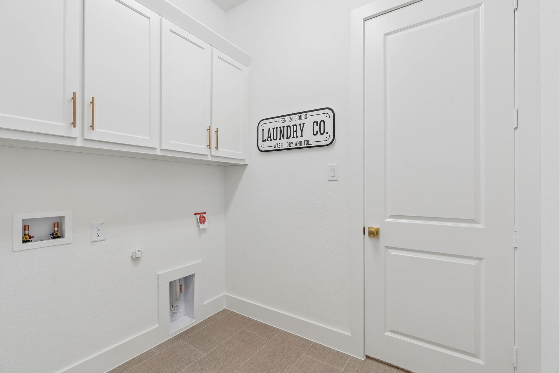 Functional Laundry Room with Storage Cabinets