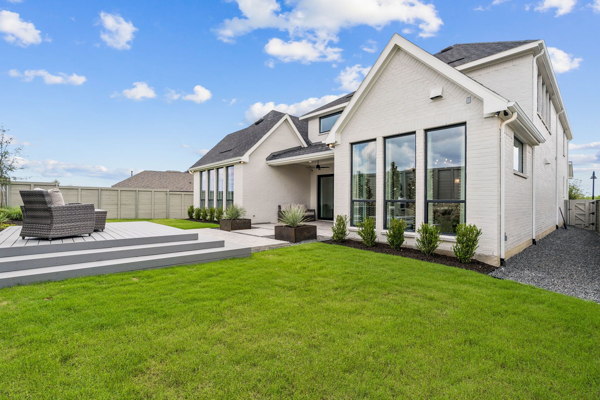 Outdoor Living with Covered Patio and Lawn