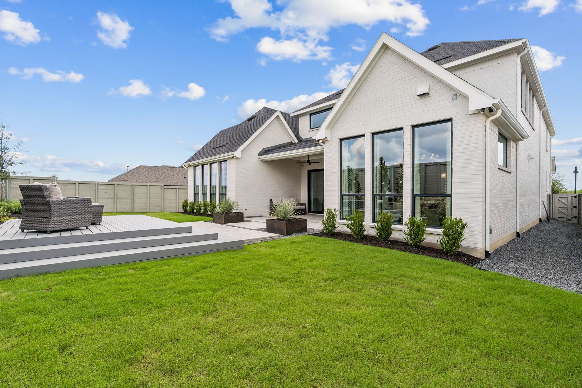 Outdoor Living with Covered Patio and Lawn