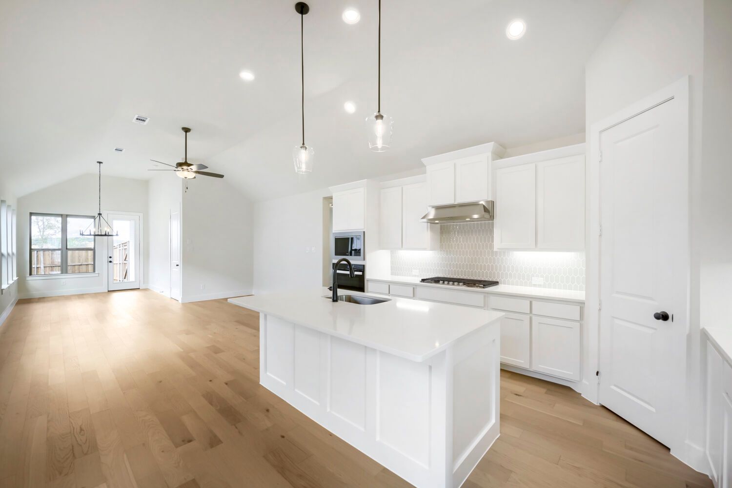 Plan 1451 Kitchen/Dining Area Representative Photo