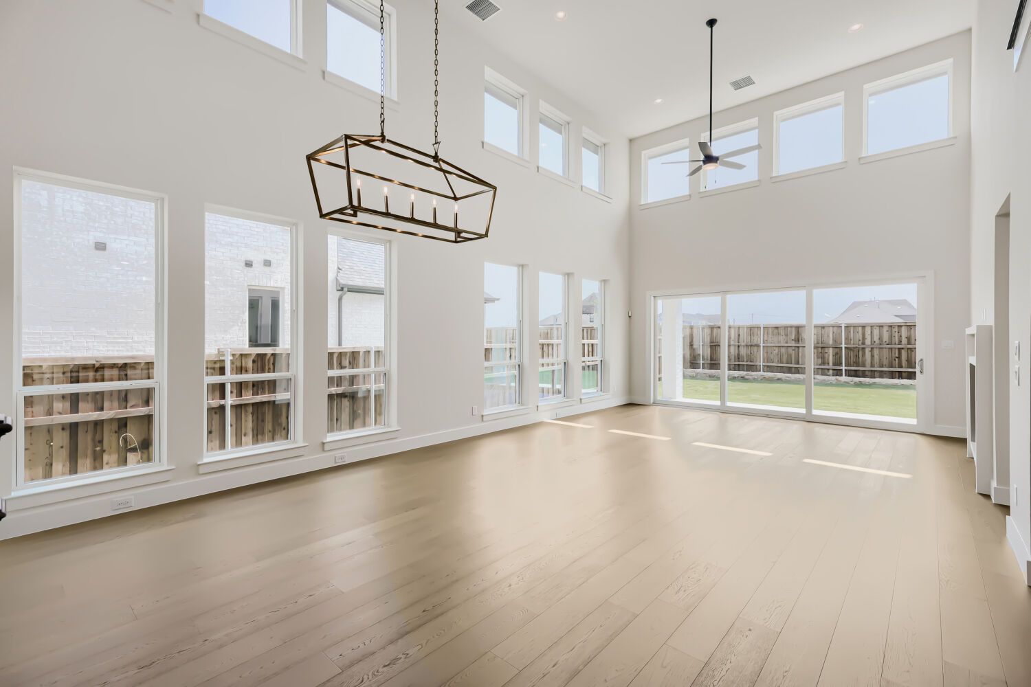 Plan 1543 Representative Photo - Open Concept Living, Dining and Living Room