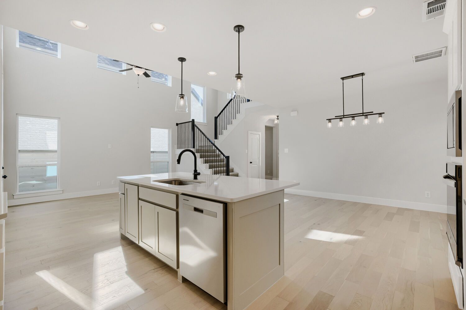 Plan 1604 Representative Photo of Kitchen, Dining Area and Living Area